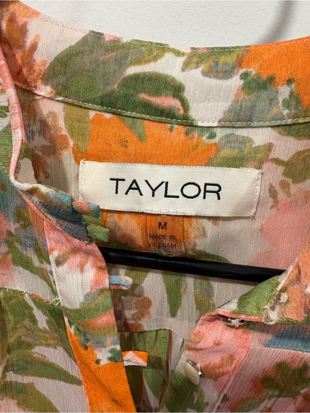 Taylor brand mini dress features a vibrant floral print and flowy bishop sleeves - Picture 4 of 8